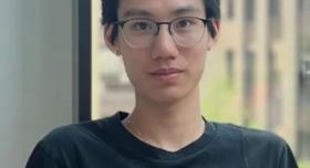 Headshot of Jadon Zheng; he has short black hair and glasses. 