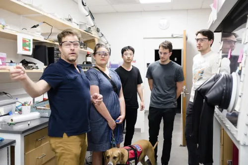 Amanda Legnick-Hall, a past RET, is given a lab orientation by faculty member Brian Korgel.