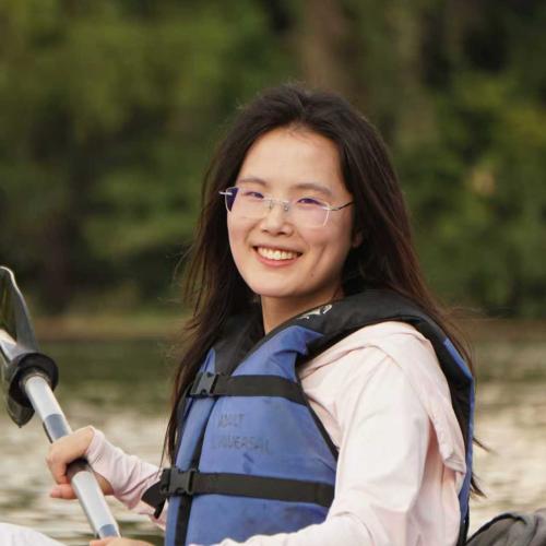 Photo of Luwen on a kayak