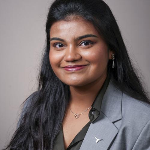 Headshot of Vidhika Damani. She is wearing a gray blazer.